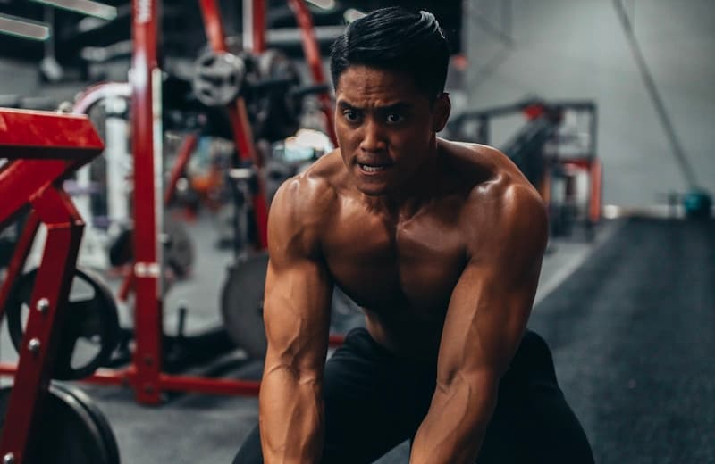 Jake Morrison, strength and conditioning coach, training intensely in the Gym Demo gym