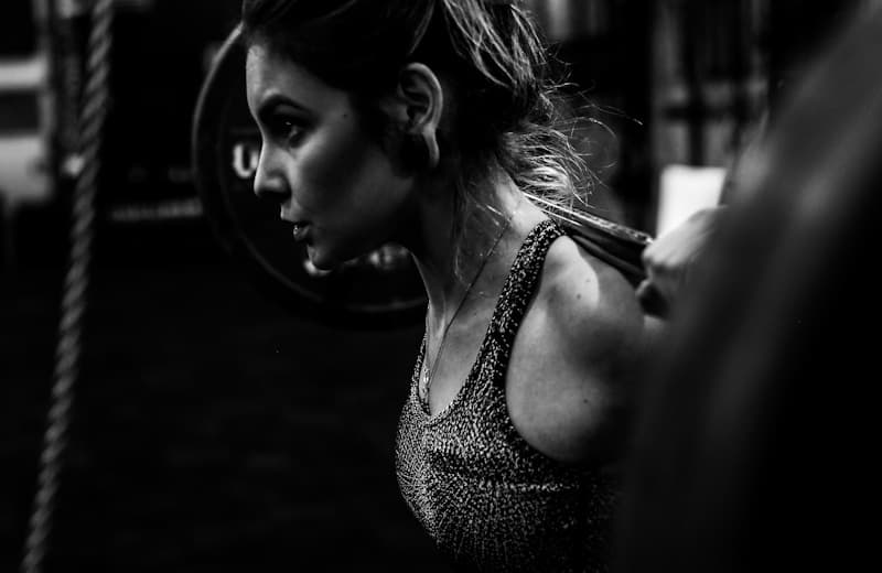 Sarah Chen, HIIT and metabolic training specialist, mid-workout at Gym Demo