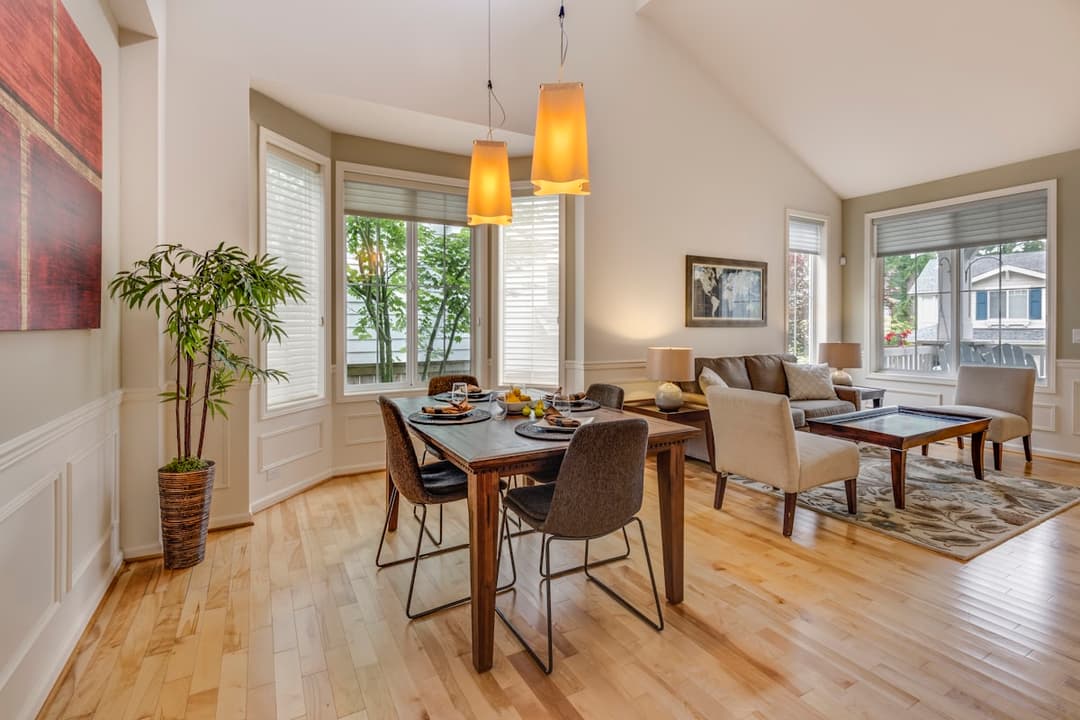 The Garden Room with king bed, courtyard access, and warm afternoon light