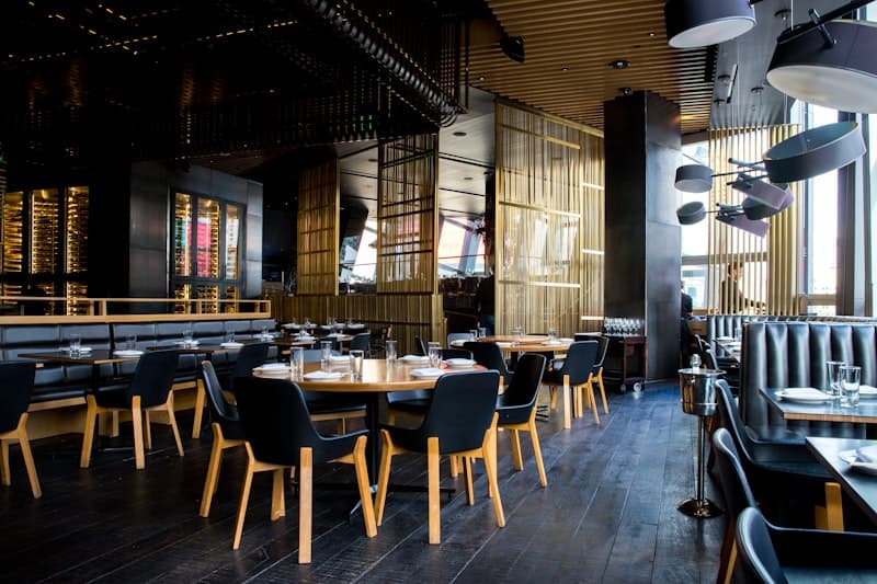 Warm candlelit dining room at Restaurant Demo with intimate table settings
