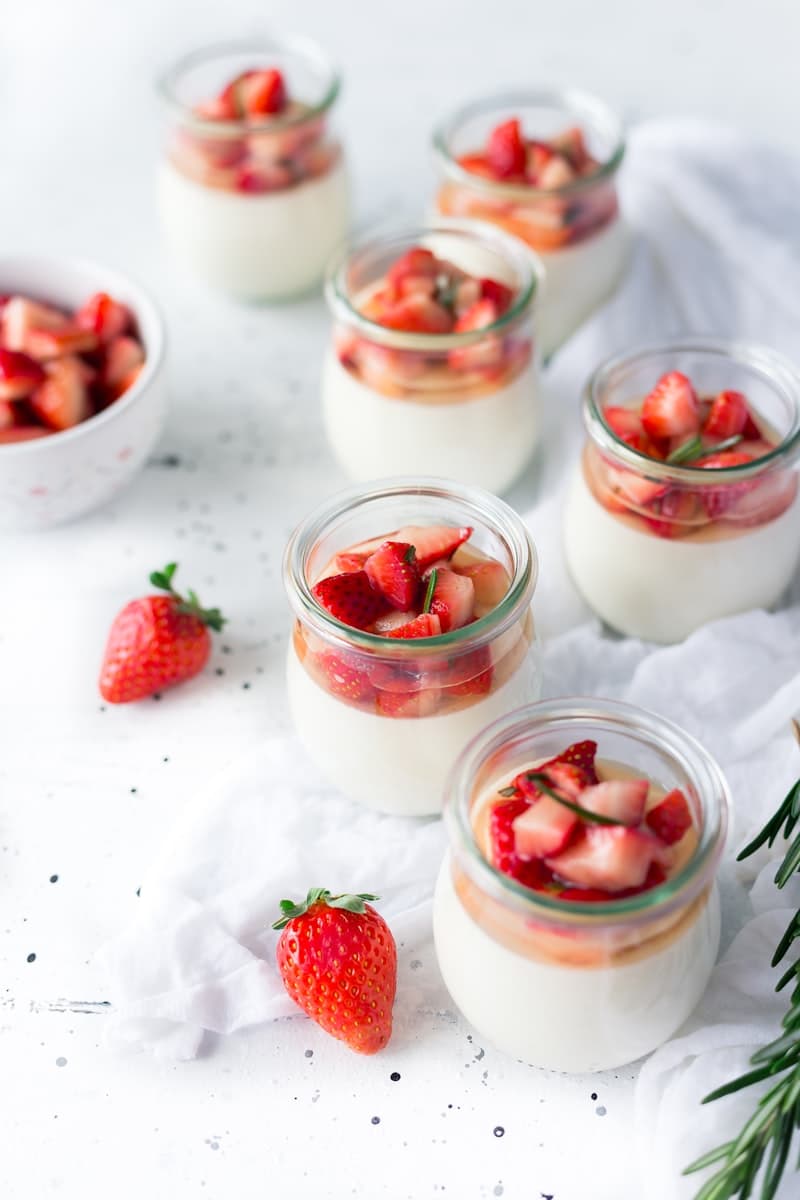 An elegant chocolate dessert with gold leaf and berry coulis