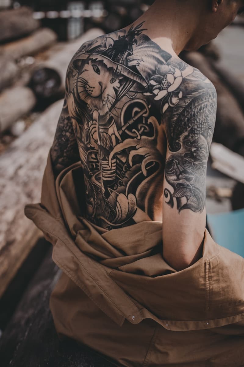 Hyper-realistic portrait tattoo with fine detail and smooth shading