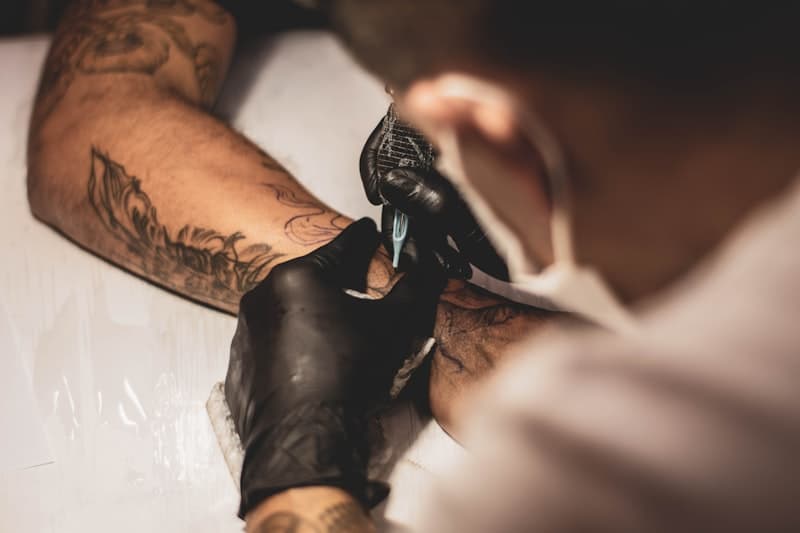 Japanese style tattoo sleeve with flowing waves and traditional motifs